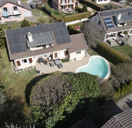 brown electric post under blue sky during daytime